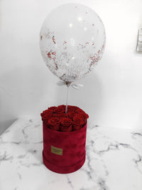 LARGE ROUND BOX OF ETERNITY ROSES AND A BALLON