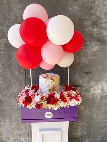 purple box and cake