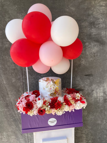purple box and cake