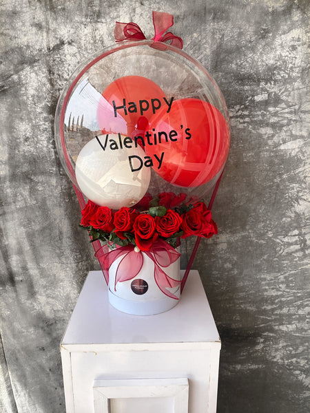 BOX OF ROSES AND A BALLON